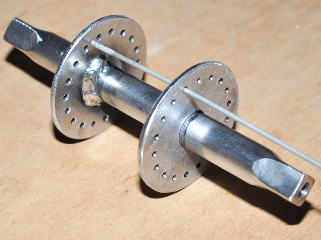 Unicycles Short and Tall - wheel lacing